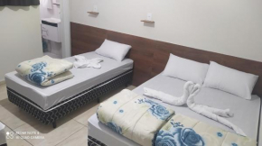 Pousada Quarto completo ar,wi fi e garagem gratuita